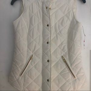 White crown and ivy vest